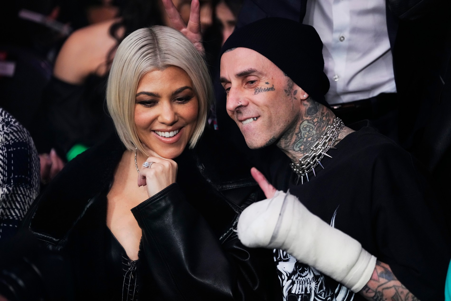 Кортни Кардашьян и Трэвис Баркер на бое UFC
Фото: Getty