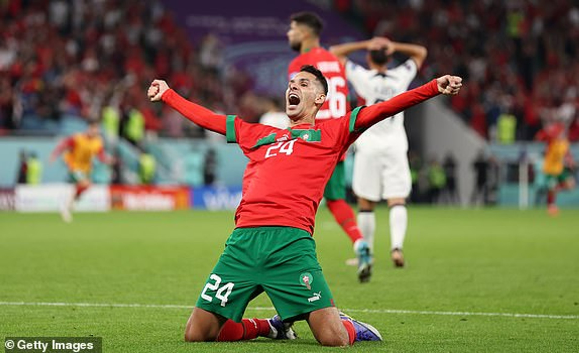 Игрок сборной Марокко празднует победу
Фото: Getty 