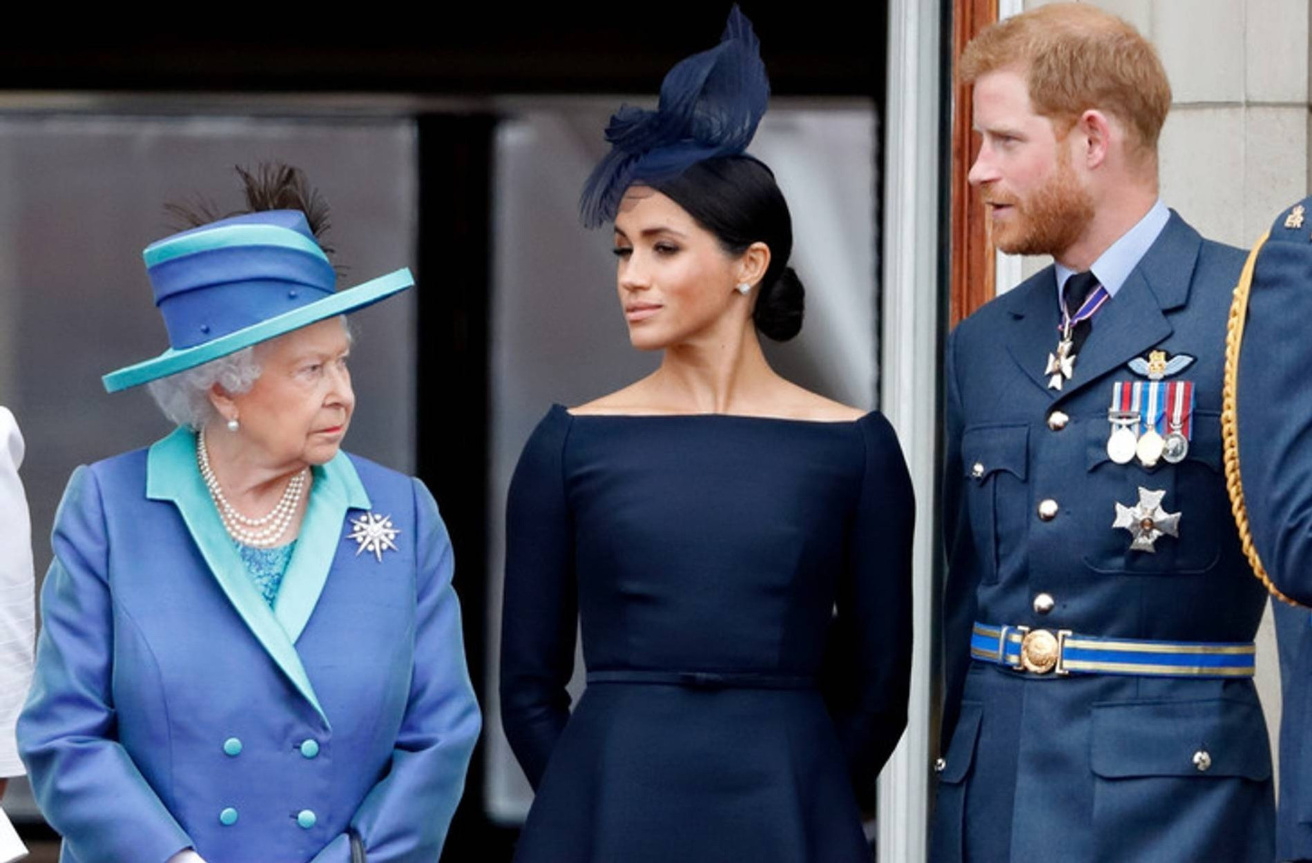Елизавета II, Меган Маркл и принц Гарри 
Фото: Getty Images