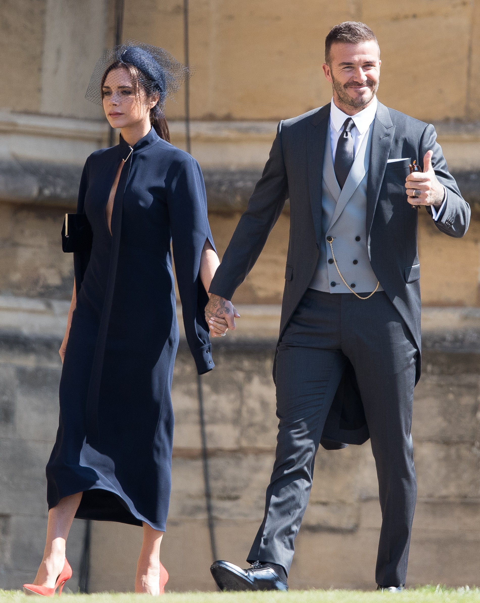 Бекхэмы на свадьбе Гарри и Меган в 2018 году. Фото: Getty Images