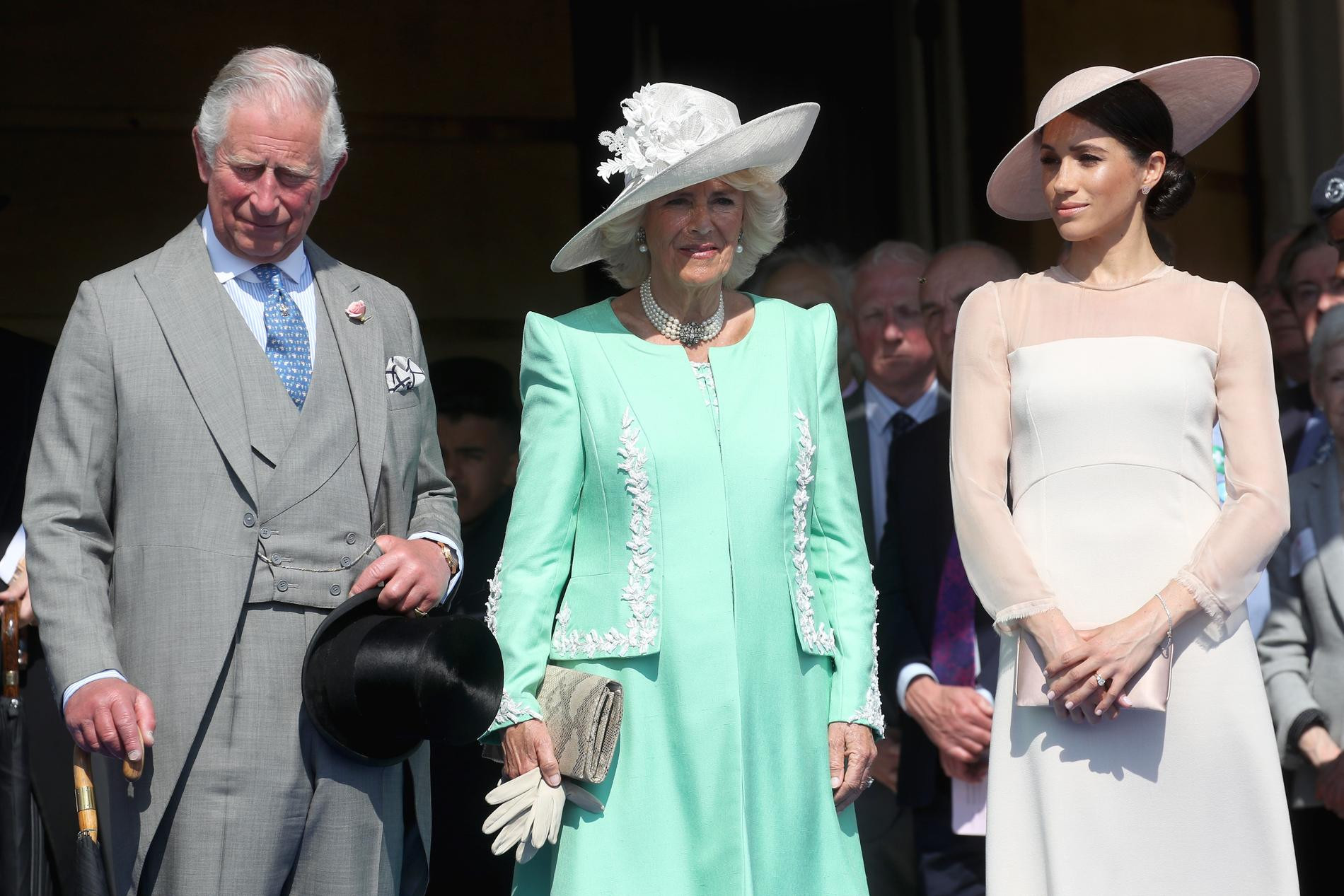 Карл III, королева Камилла и Меган Маркл. Фото: Getty Images