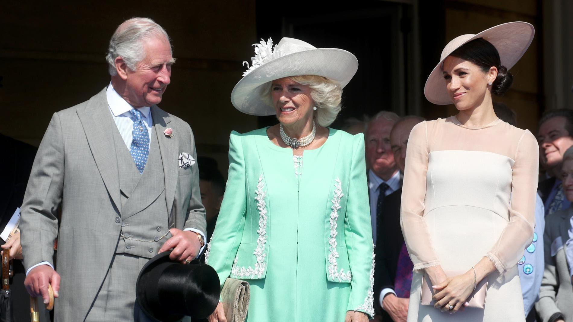Карл III, королева Камилла и Меган Маркл. Фото: Getty Images