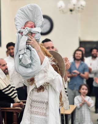 Мария, дочь Леонида Парфёнова, с сыном. Фото: Instagram (запрещён в РФ) @ginger.minion