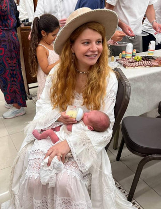 Мария, дочь Леонида Парфёнова, с сыном. Фото: Instagram (запрещён в РФ) @ginger.minion