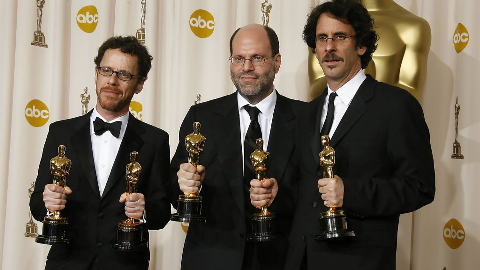 Братья Коэны и Скотт Рудин (в центре). Фото: Getty