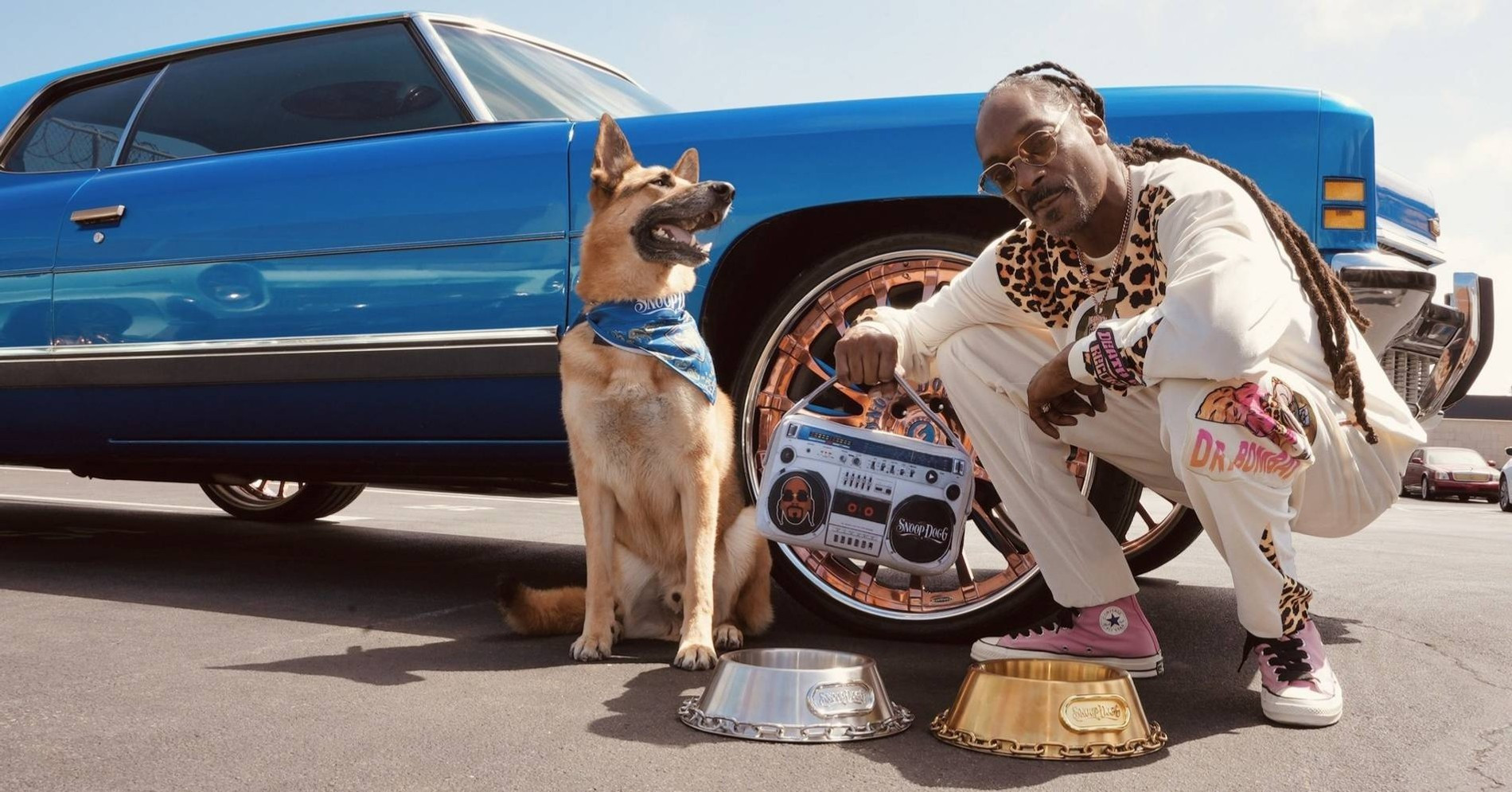 Снупп Догг и четвероногая модель
Фото: Snoop Doggie Doggs