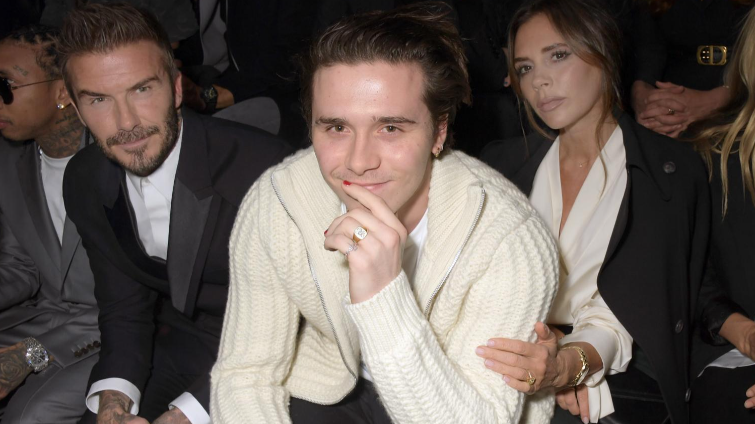 Дэвид Бекхэм с сыном Бруклином и женой Викторией. Фото: Getty Images